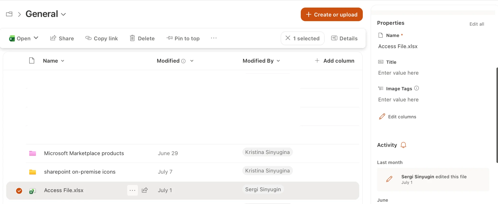 SharePoint document library showing metadata columns and version history