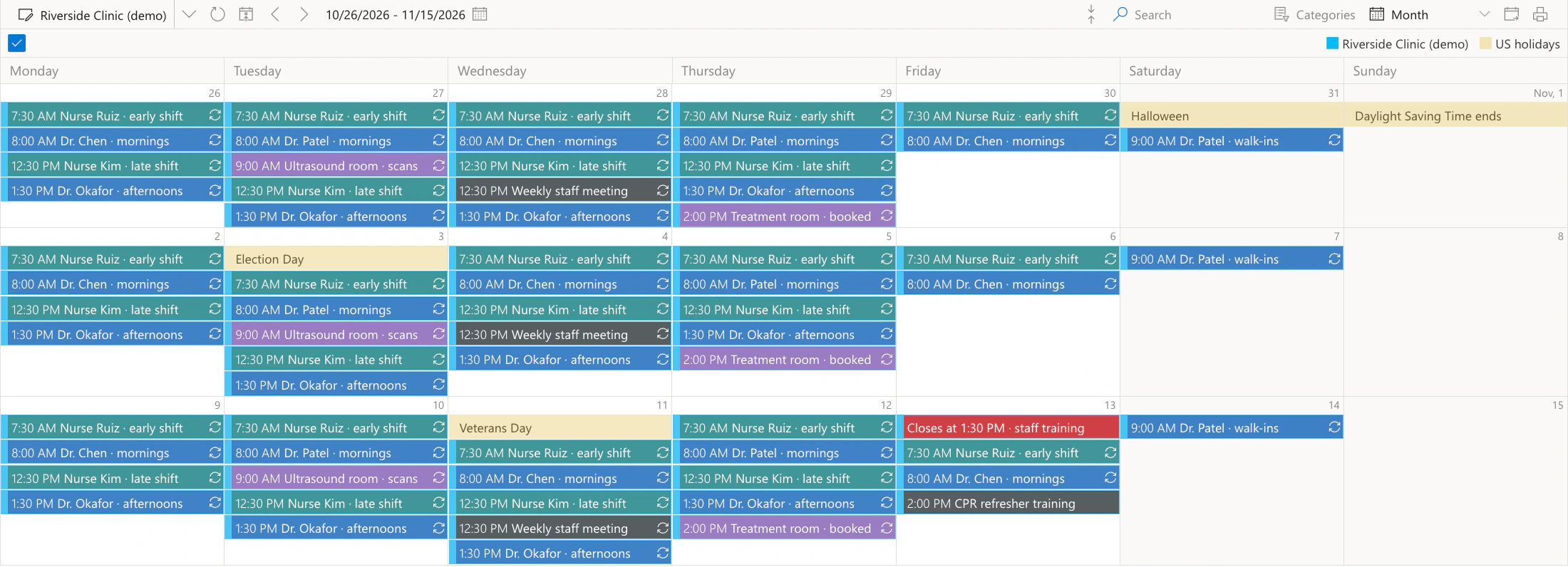 Virto Shared Calendar, month view of the Riverside Clinic (demo) calendar from 26 October to 15 November: doctors' clinics in blue, such as Dr. Chen at 8:00 AM on Mondays, Wednesdays and Fridays, Dr. Patel at 8:00 AM on Tuesdays and Thursdays and Dr. Okafor at 1:30 PM from Monday to Thursday, nurse shifts in teal, Nurse Ruiz's early shift at 7:30 AM and Nurse Kim's late shift at 12:30 PM, room bookings in purple, the Ultrasound room on Tuesdays and the Treatment room on Thursdays, the Weekly staff meeting on Wednesdays and the CPR refresher training at 2:00 PM on Friday the 13th in dark grey, Closes at 1:30 PM on that Friday in red, and US holidays from a feed in pale yellow, such as Halloween on the 31st, Election Day on the 3rd and Veterans Day on the 11th